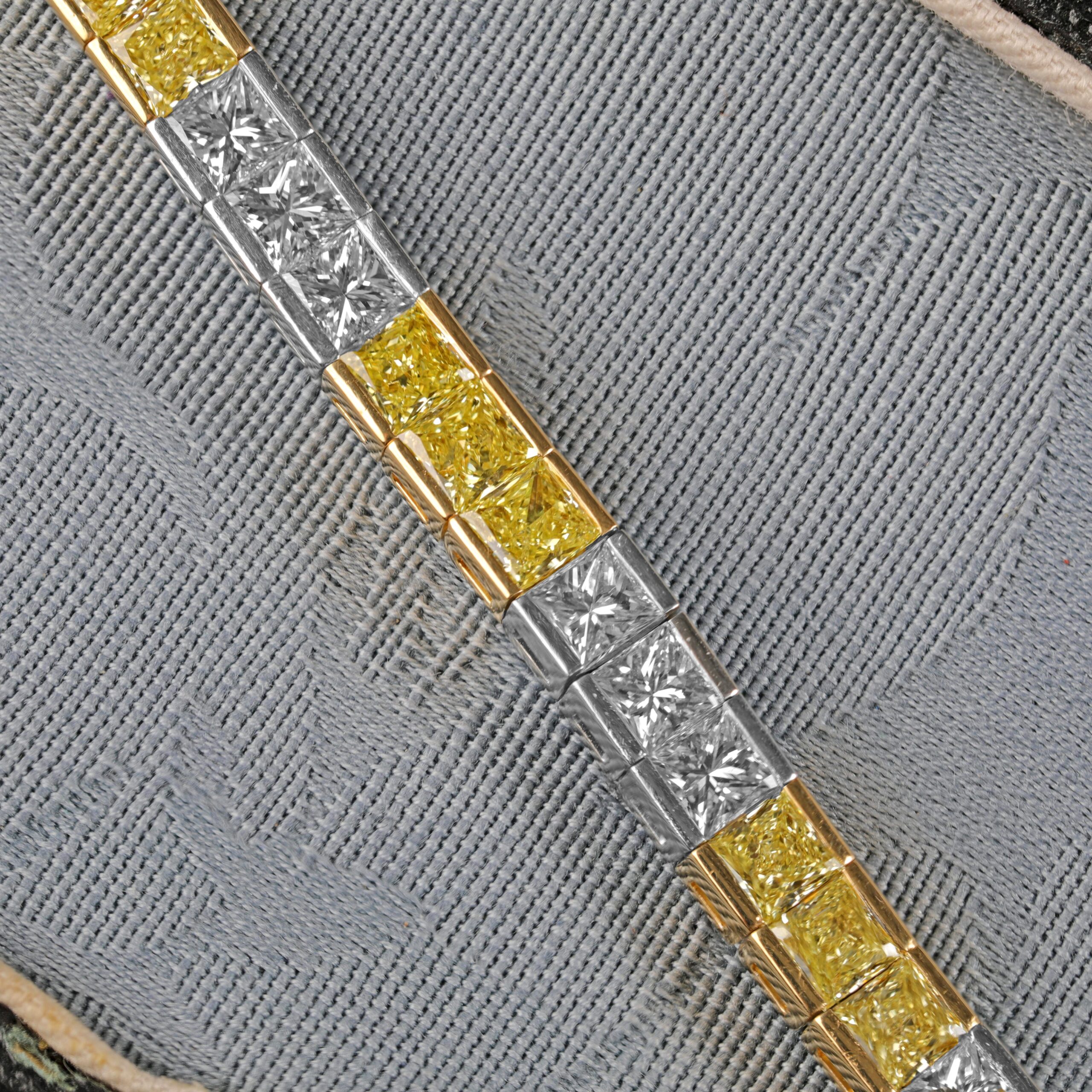 Yellow and white diamond tennis bracelet featuring alternating fancy yellow and white diamonds in an elegant tapered design crafted in 18K yellow gold and platinum.